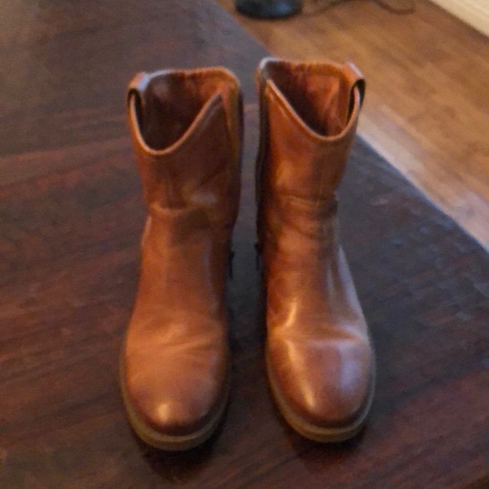 Brown boots . Used some wear but not bad .